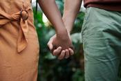 a couple holding hands