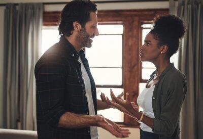 Shot of a young couples having an intense argument at home