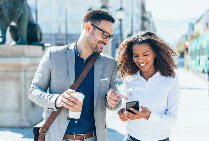 High-achievers walking together as a couple